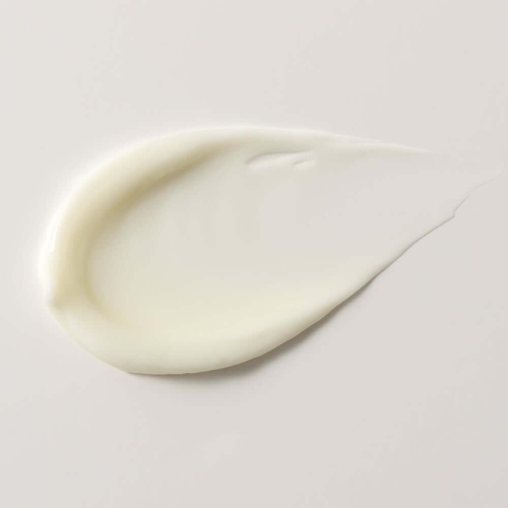 Close-up of Bidalli Vegan Wrinkle-Care Intense Eye Cream texture, smooth ivory cream with rich moisturizing consistency for anti-aging and under-eye hydration