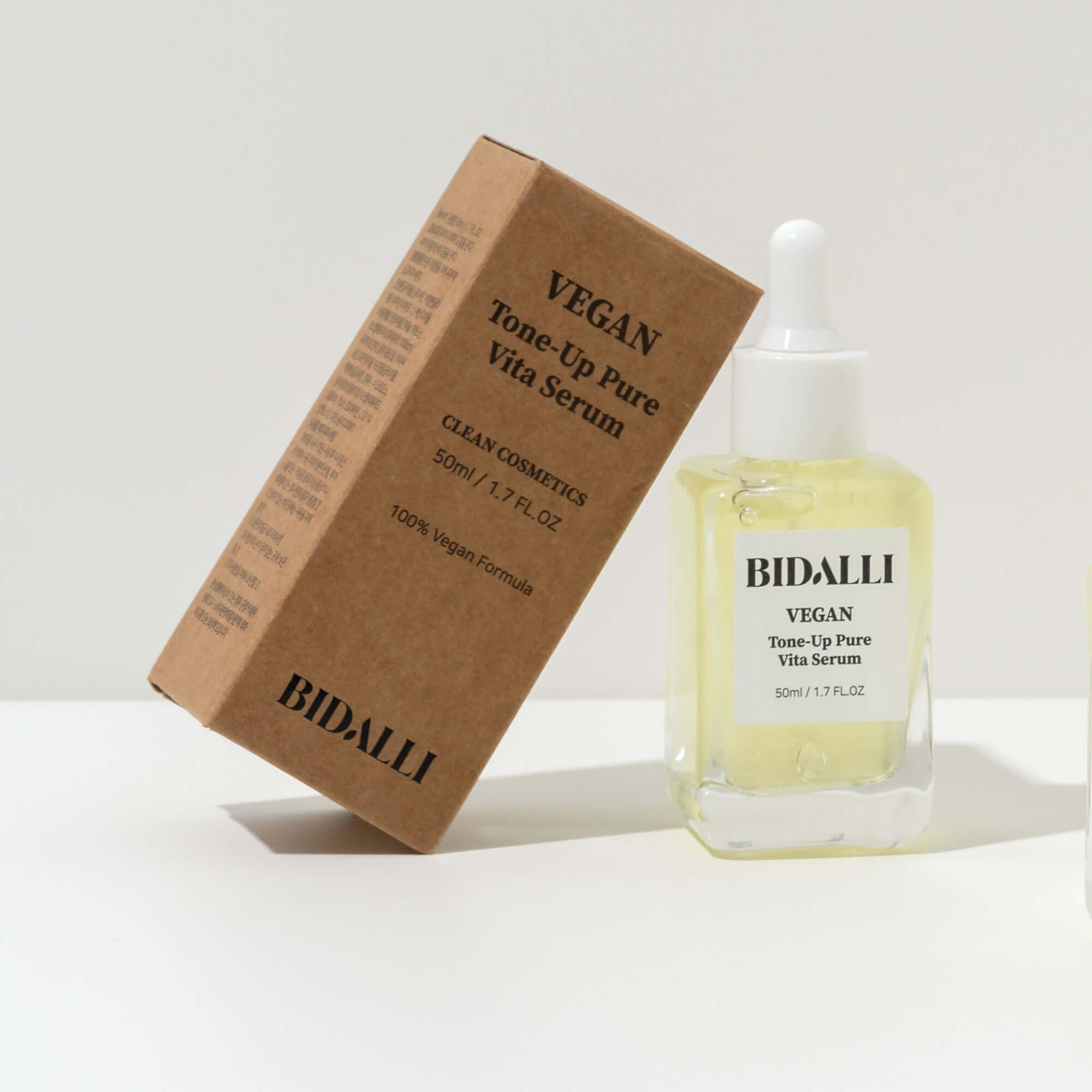 Bidalli Vegan Tone-Up Pure Vita Serum with box packaging, brightening and nourishing vitamin serum in glass dropper bottle, 50ml