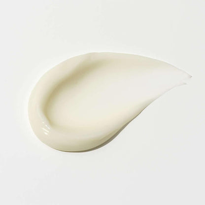 Smooth, creamy texture of BIDALLI Vegan Calming Pure Facial Cream spread on a white surface