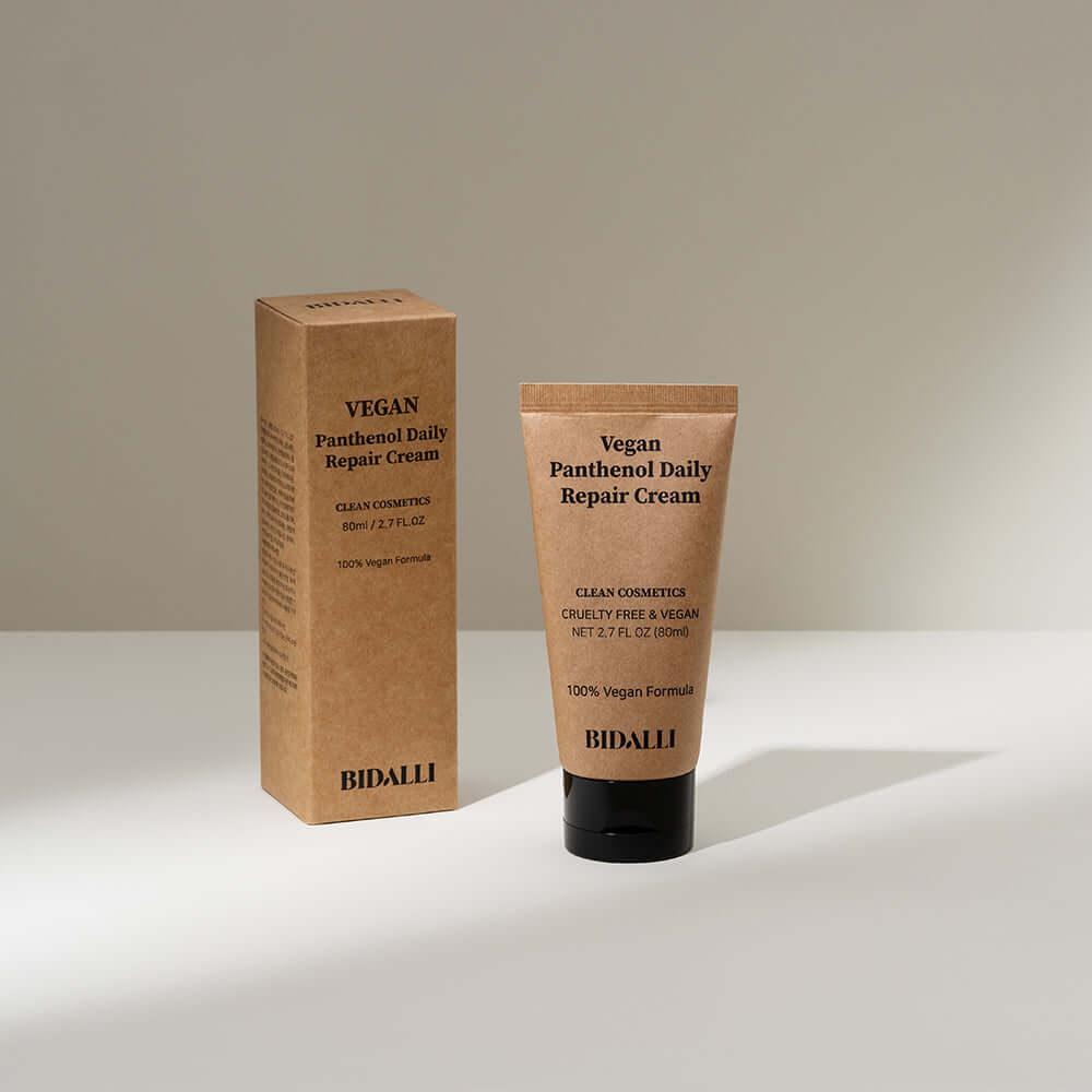 Bidalli Vegan Panthenol Daily Repair Cream in sustainable kraft packaging, tube and box displayed under soft natural light
