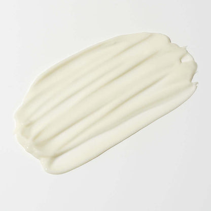 Smooth, even swipe of BIDALLI Vegan Calming Pure Facial Cream showing silky texture and spreadability on white surface