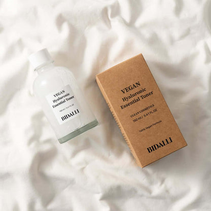 Bidalli Vegan Hyaluronic Essential Toner with kraft box on soft white fabric, deeply hydrating vegan toner for sensitive and dry skin, 160ml